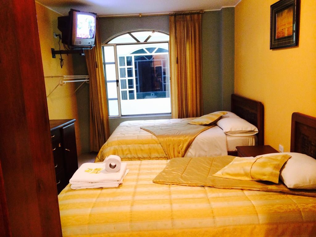 Hostal Grand Rio Baños Zimmer foto